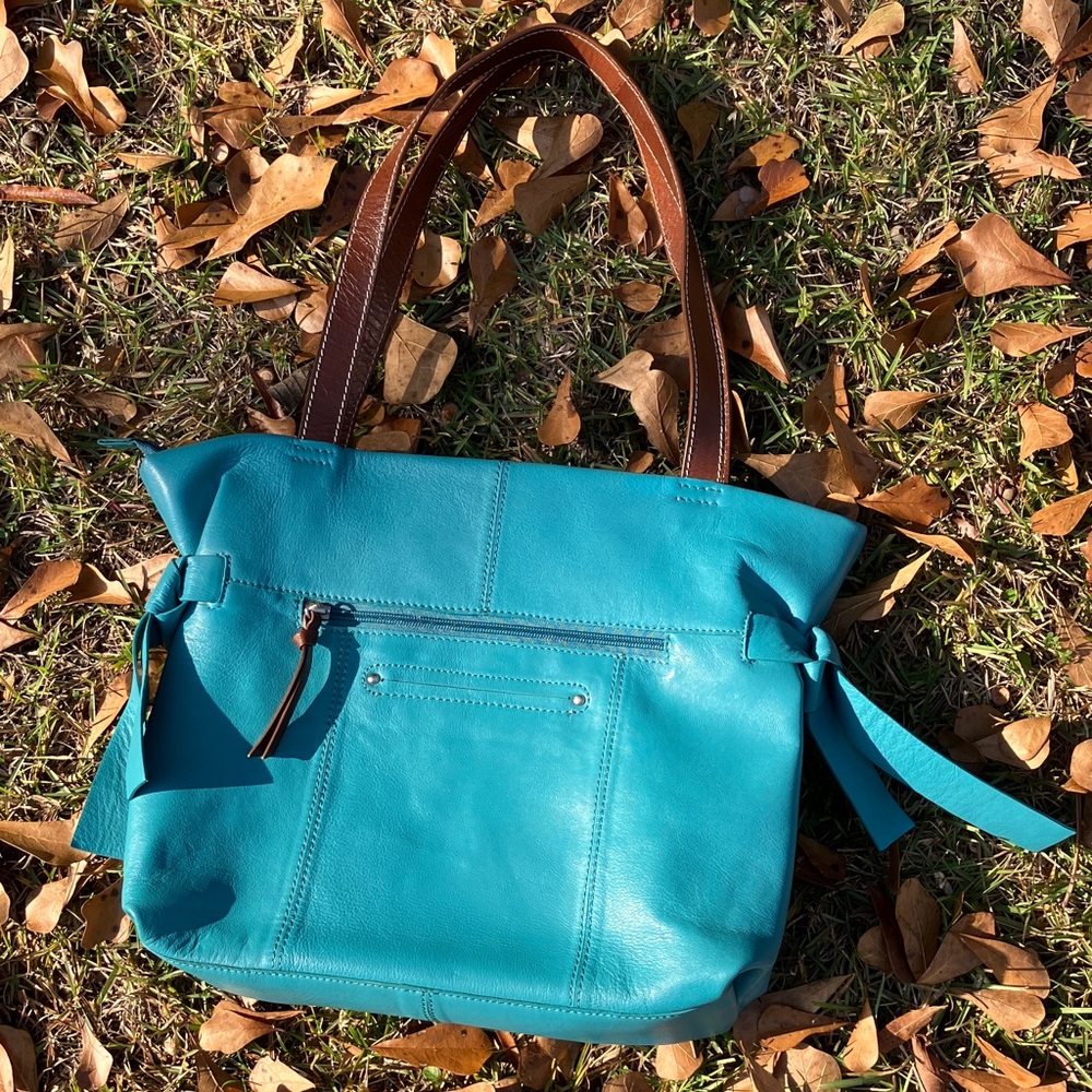 NINO BOSSI leather handbag.
